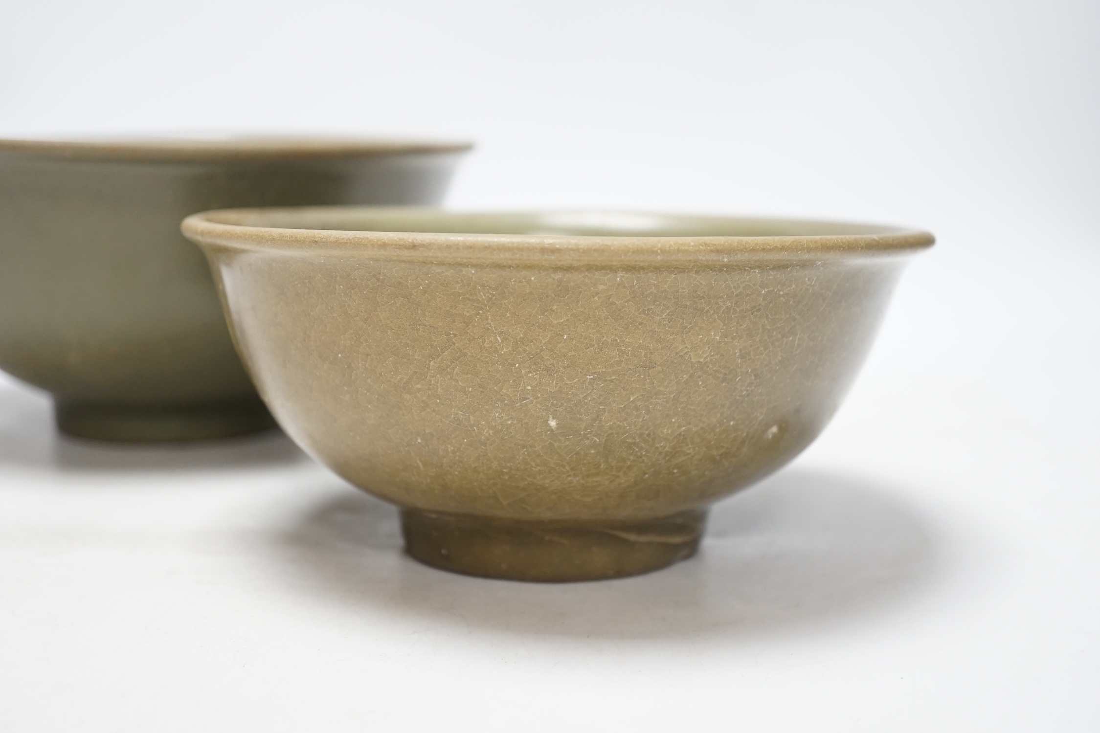 Two Chinese celadon bowls, Yuan-Ming dynasty, largest 22.5cm diameter